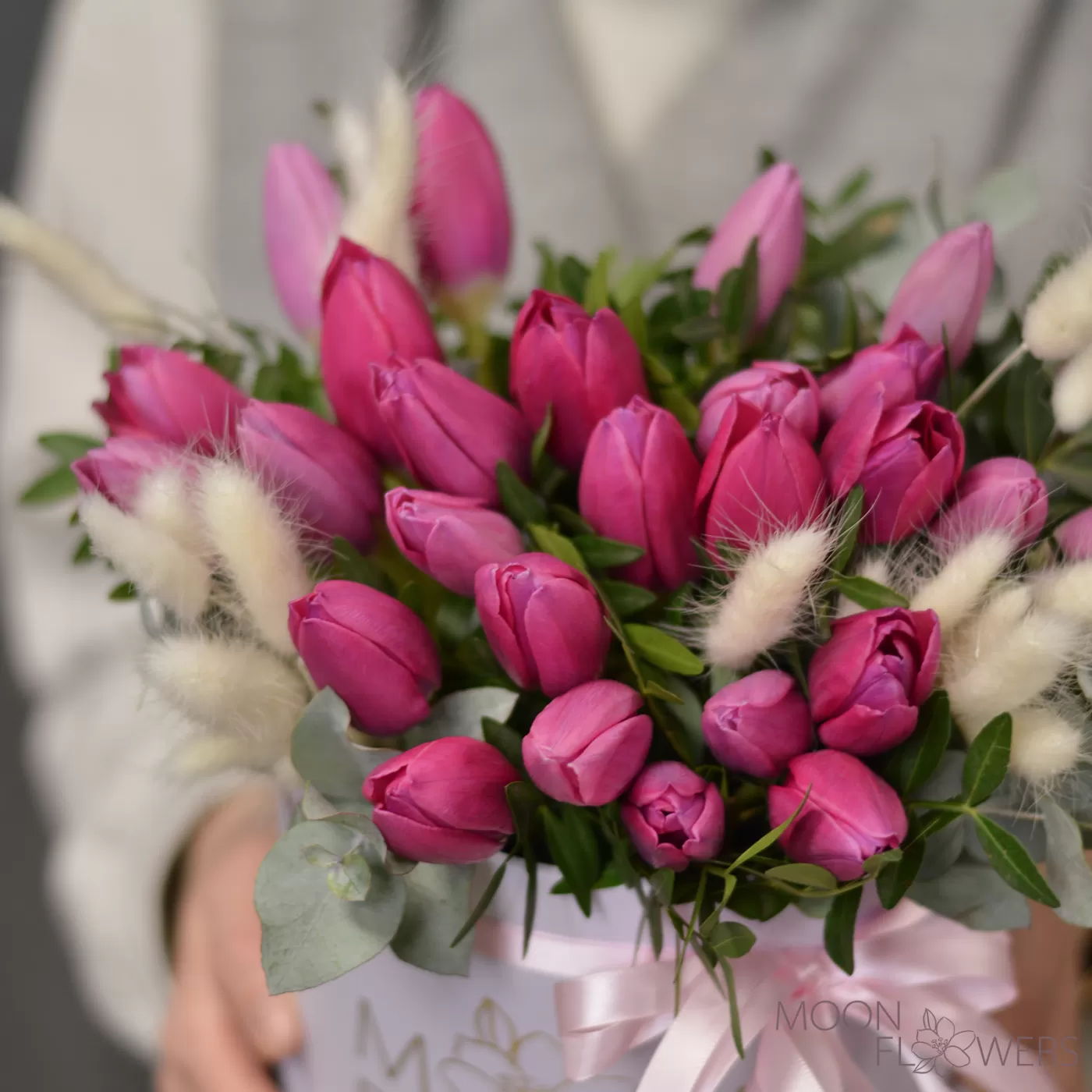 White box with pink tulips, eucalyptus and lagurus