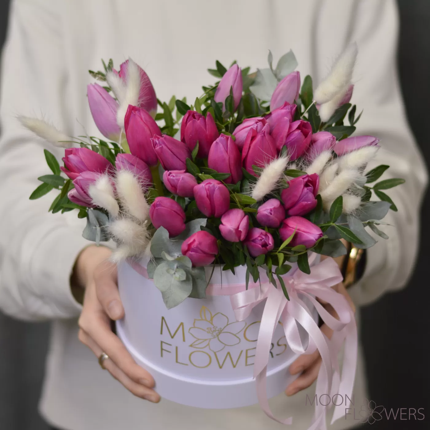 White box with pink tulips, eucalyptus and lagurus