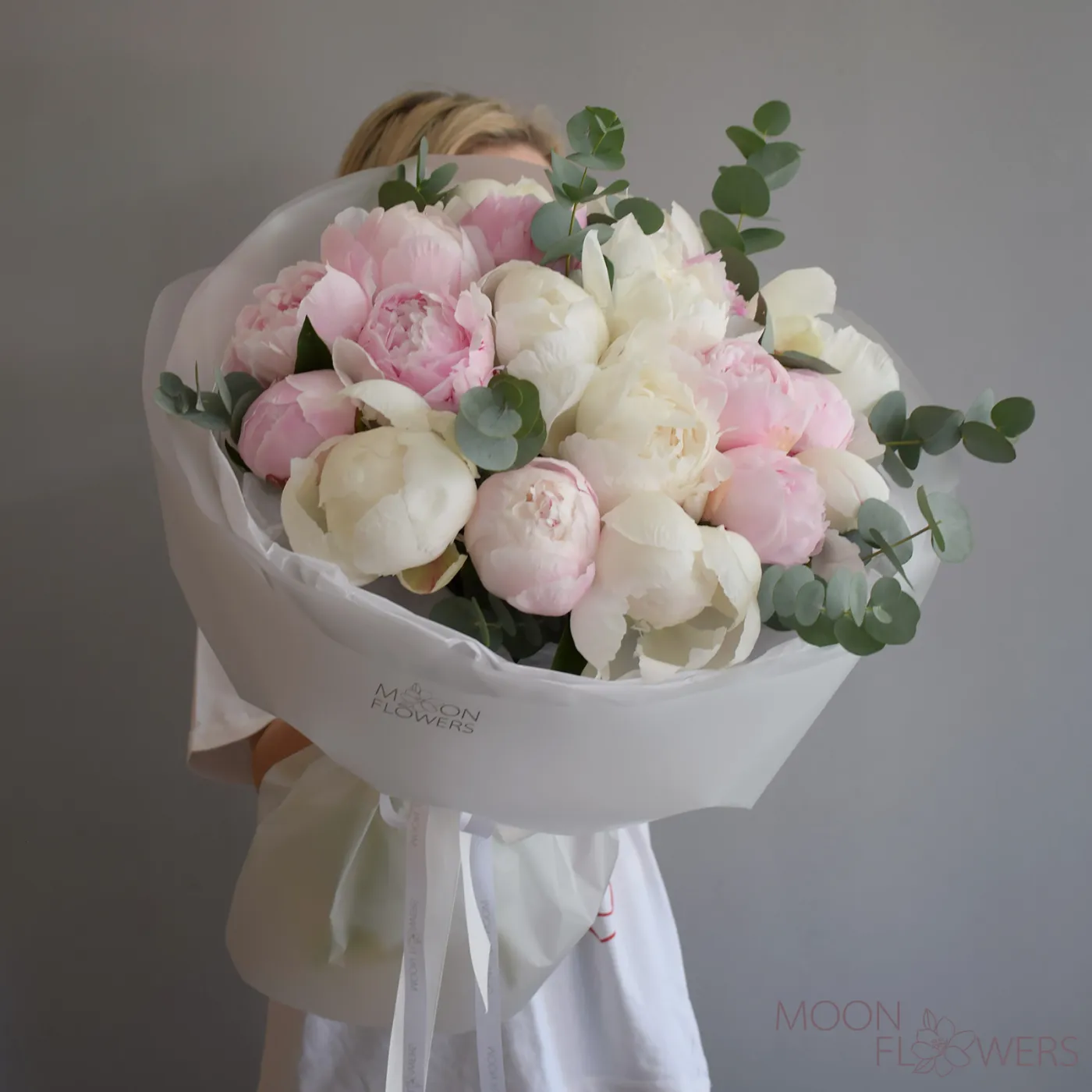 Bouquet of 19 white-pink Dutch peonies with eucalyptus