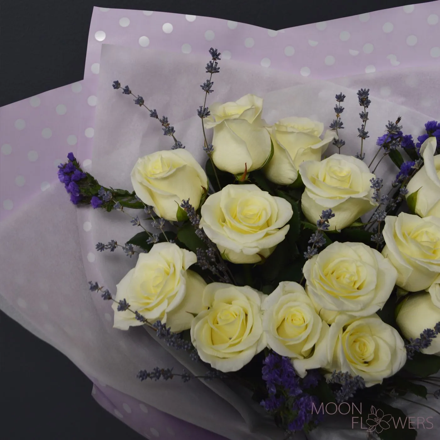 Bouquet of white roses and lavender