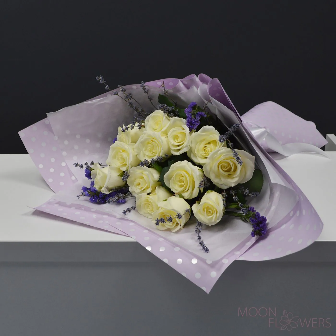 Bouquet of white roses and lavender