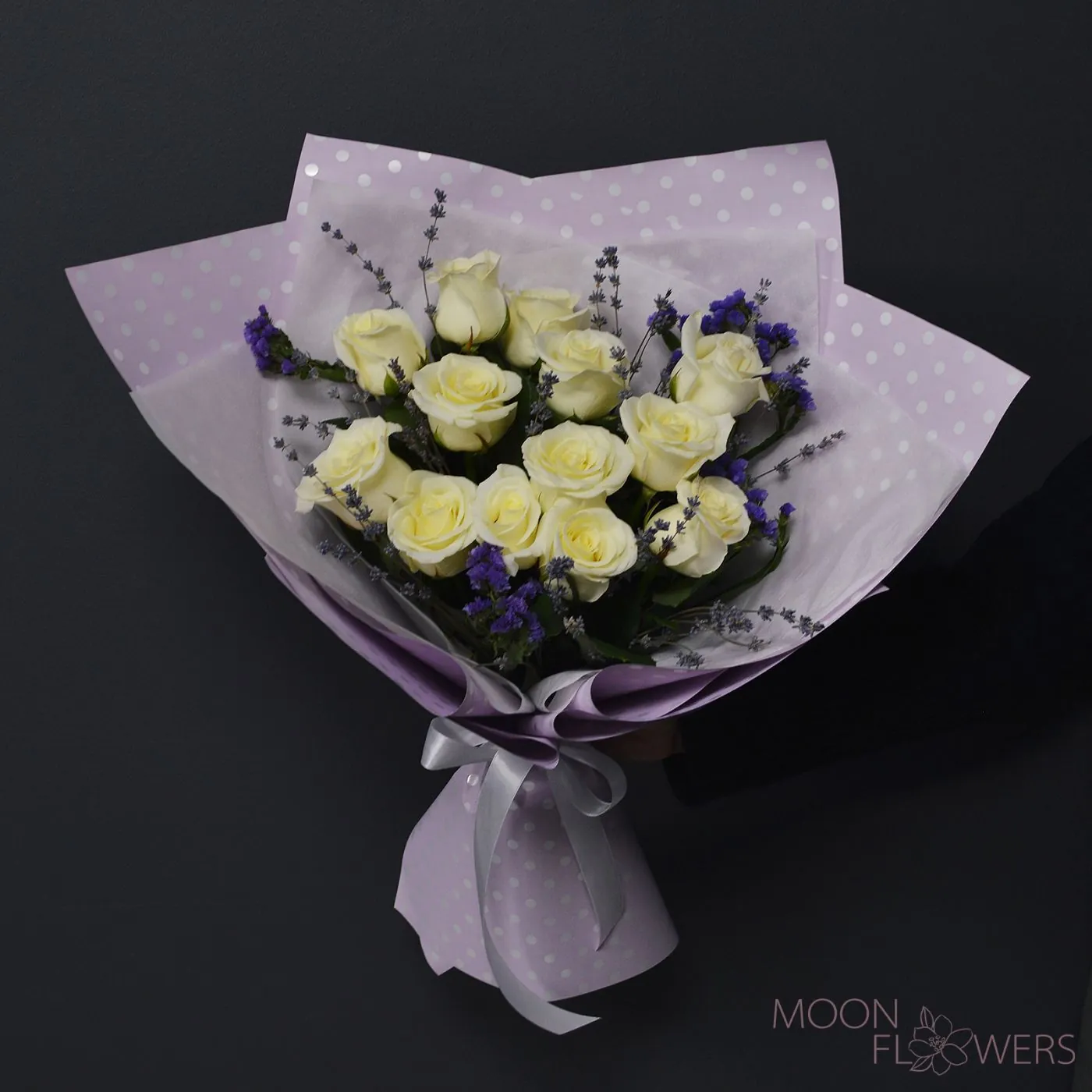 Bouquet of white roses and lavender