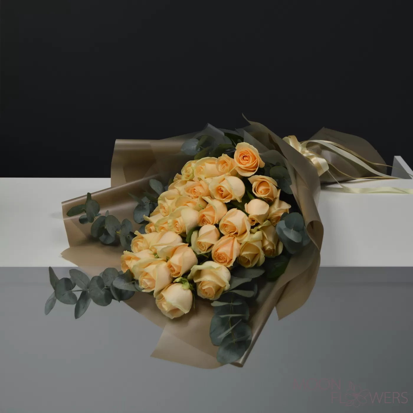 Bouquet of cream roses and eucalyptus
