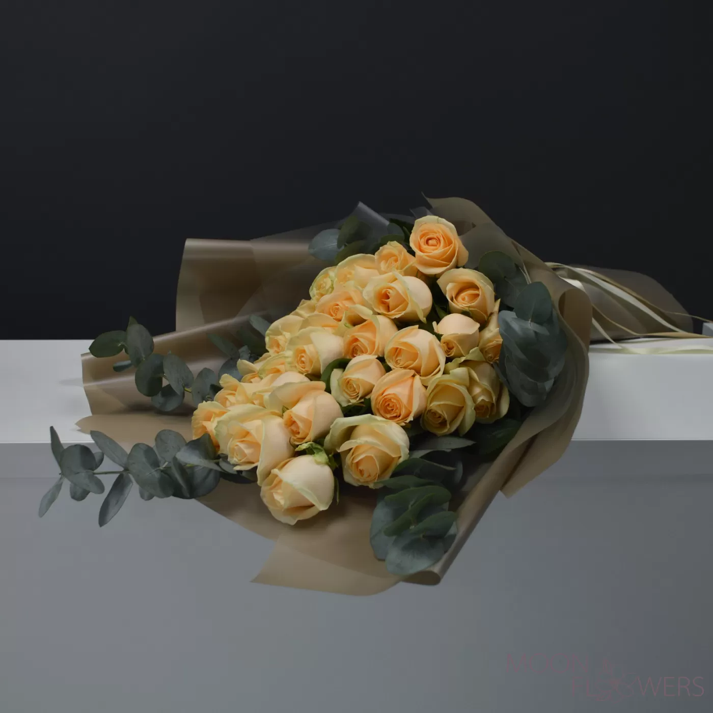 Bouquet of cream roses and eucalyptus