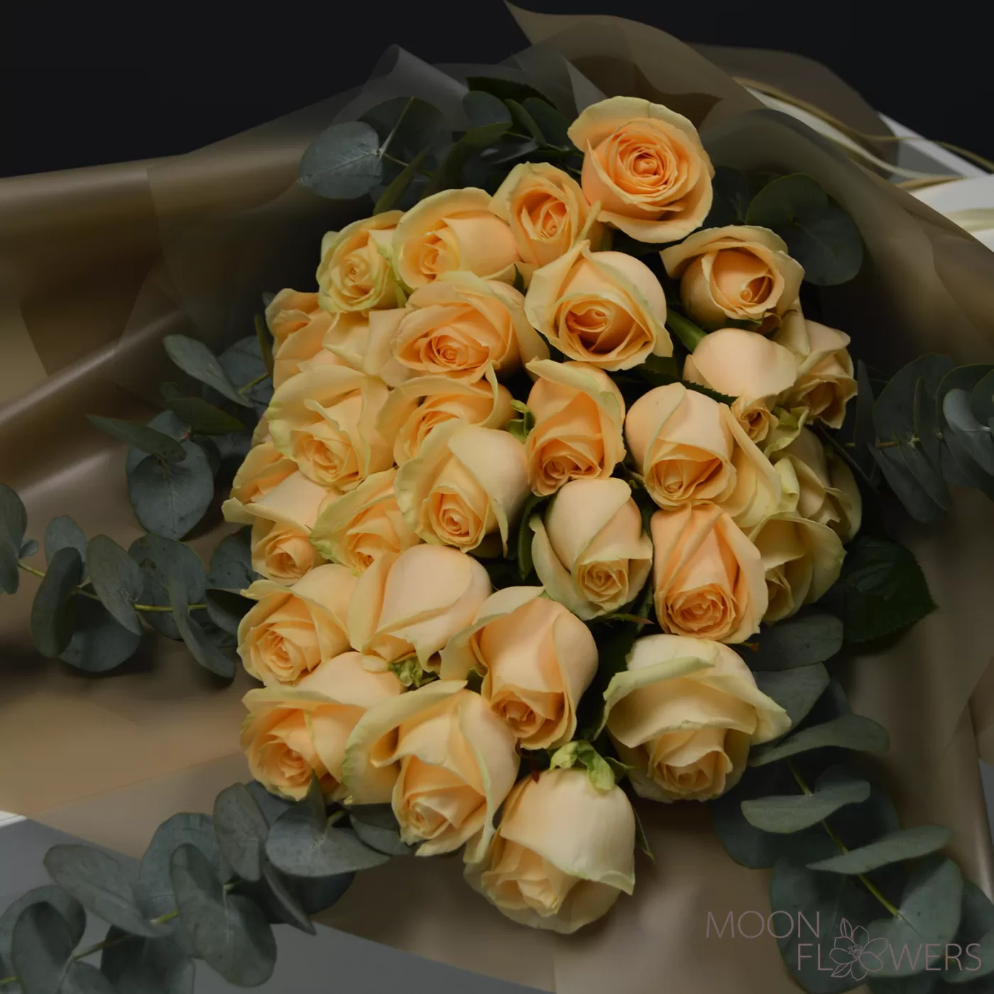 Bouquet of cream roses and eucalyptus