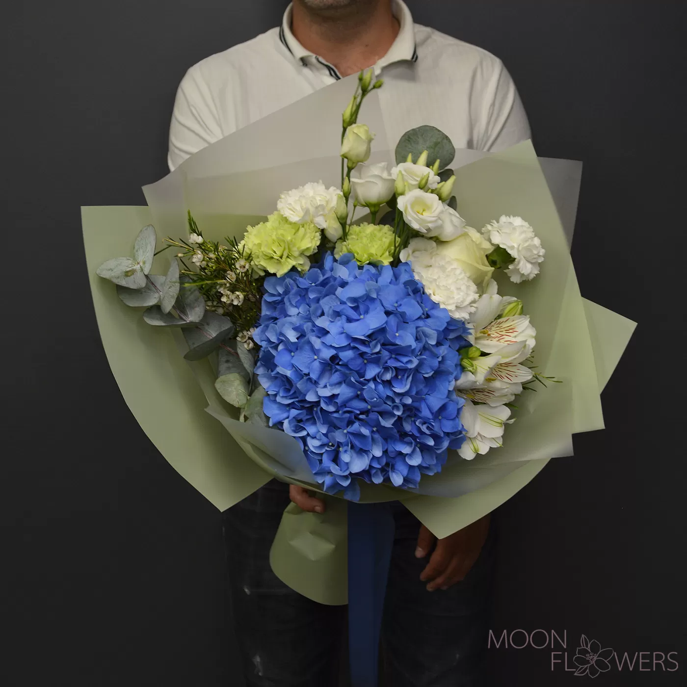 Bouquet of blue hydrangea, carnation and eustoma