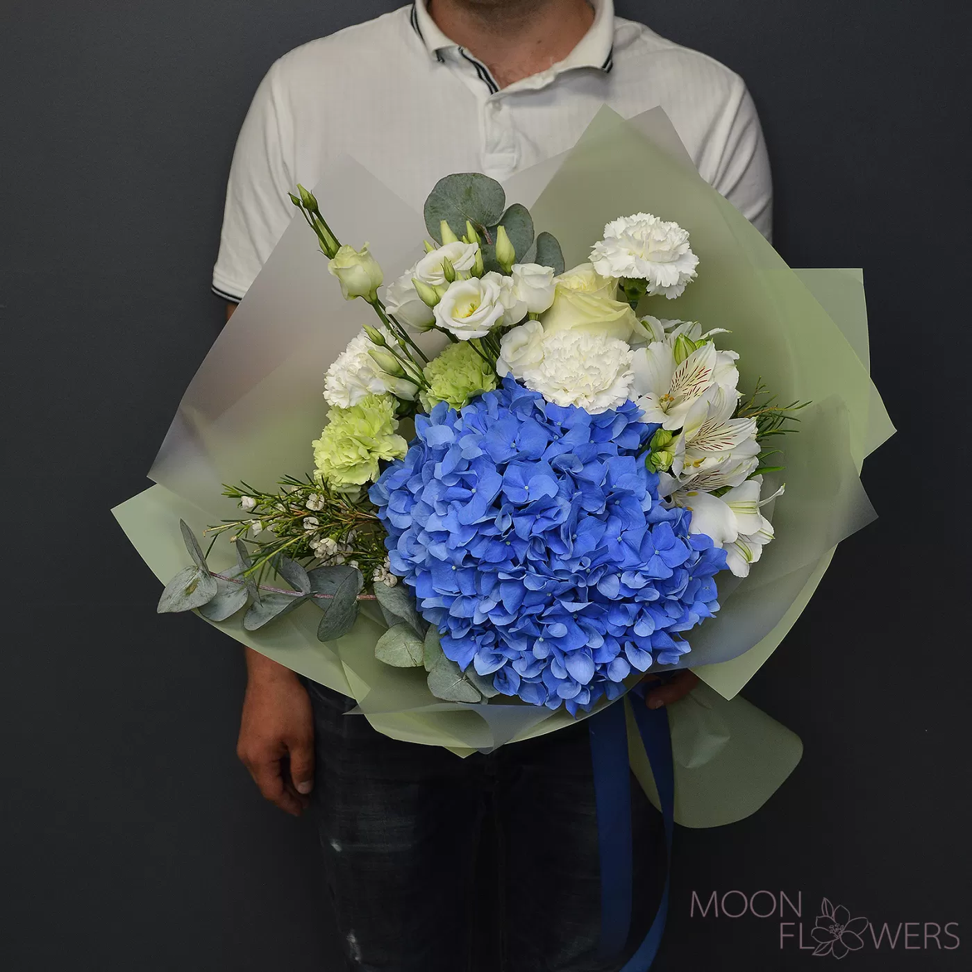 Bouquet of blue hydrangea, carnation and eustoma