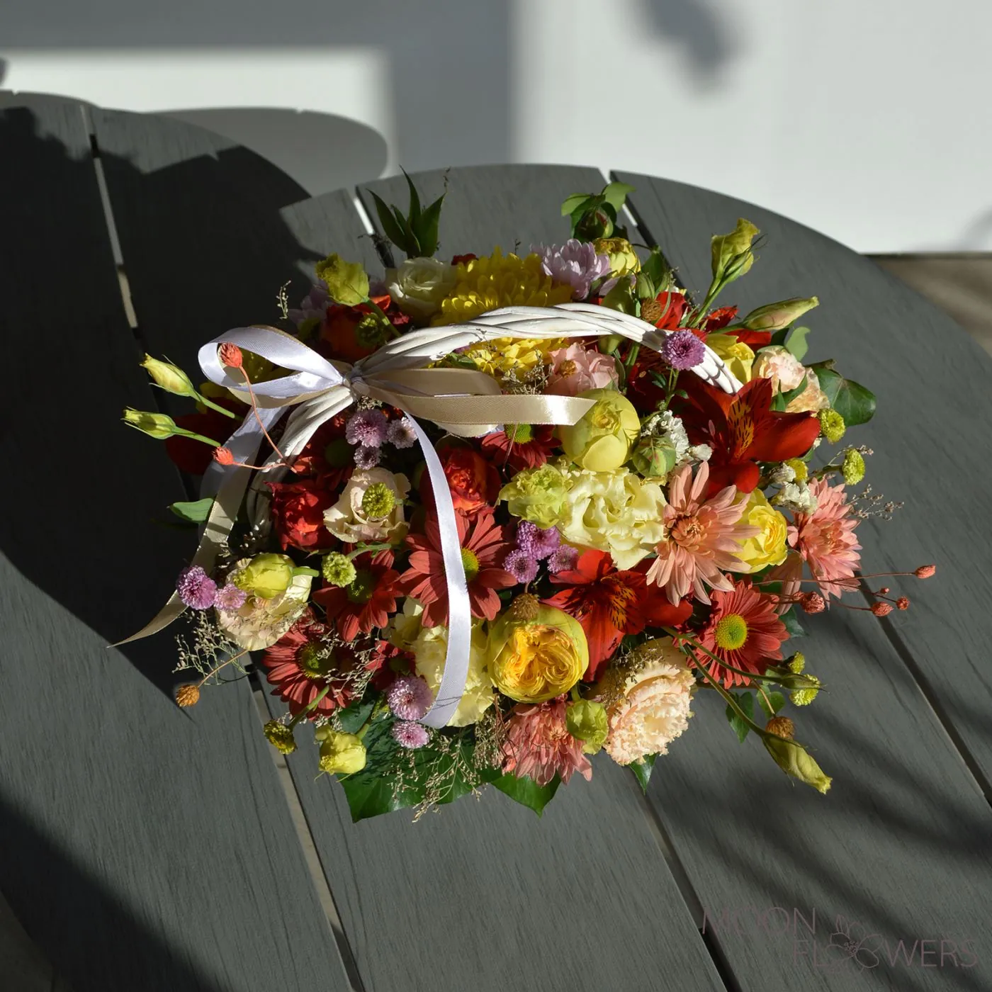 Basket with yellow and orange flowers (M)
